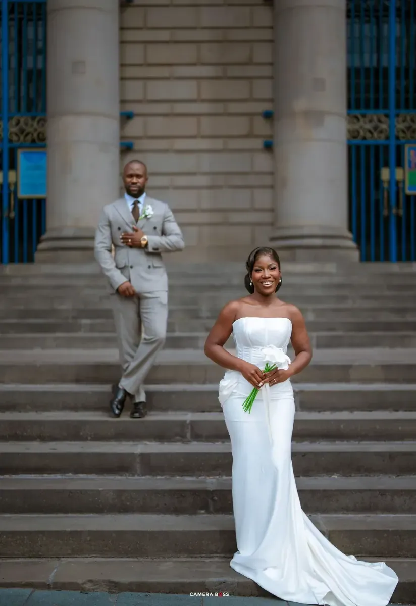 Bride on stone steps. CameraBoss portfolio: Opeyemi Wedding Portrait.
