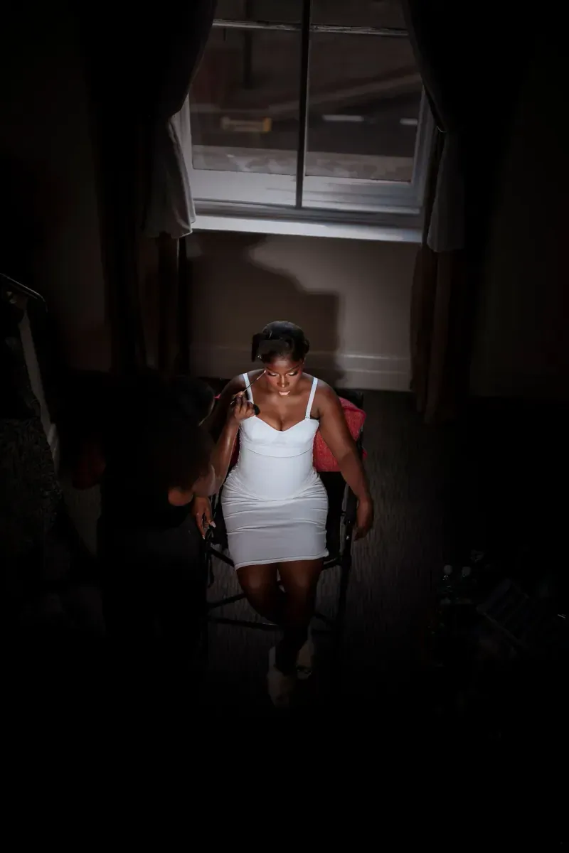 A wedding portrait silhouetted beside a window. CameraBoss portfolio: Opeyemi Wedding Portrait.