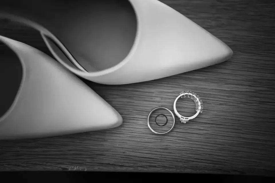 Wedding rings and white heels