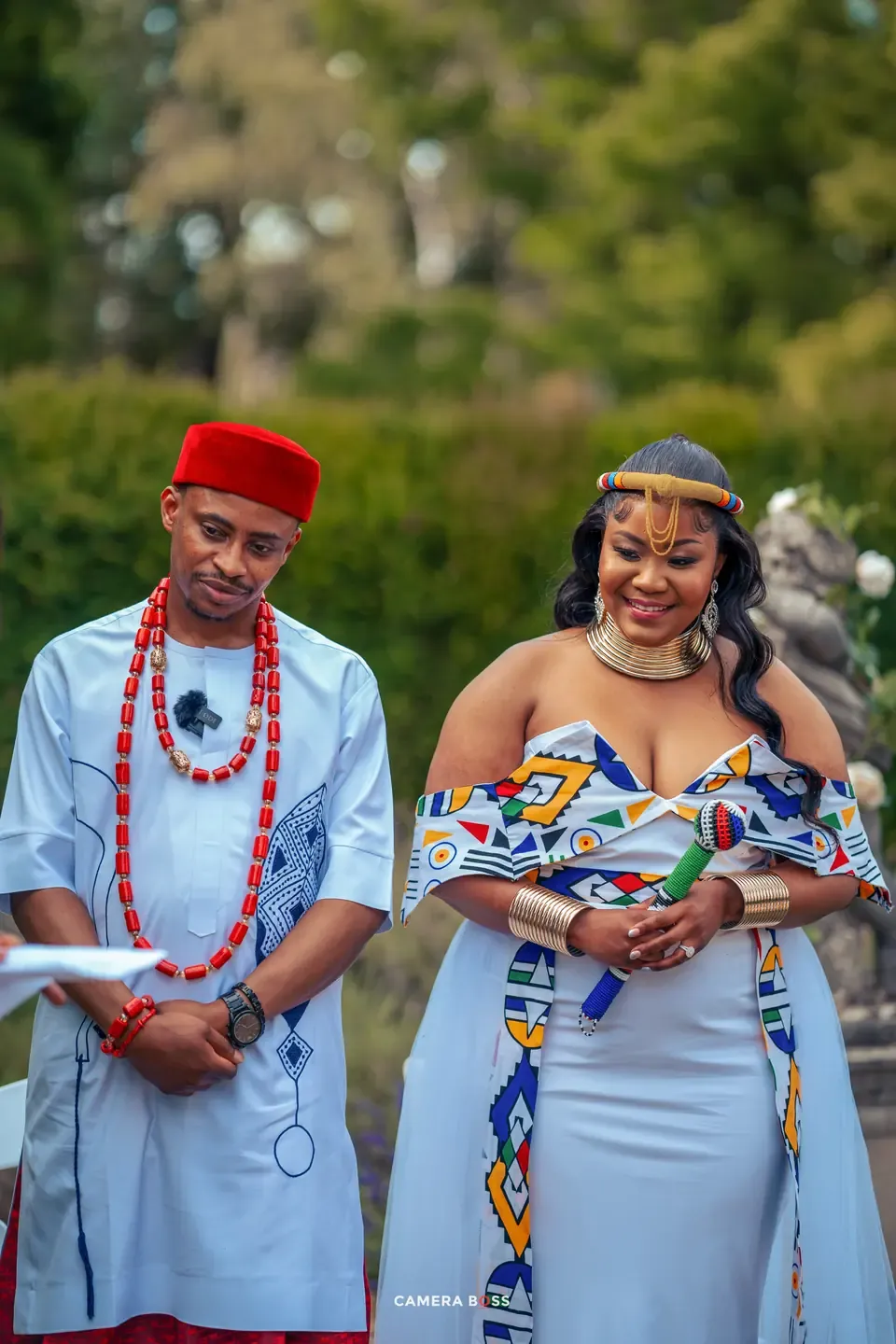 Vanessa and her partner together in traditional dress