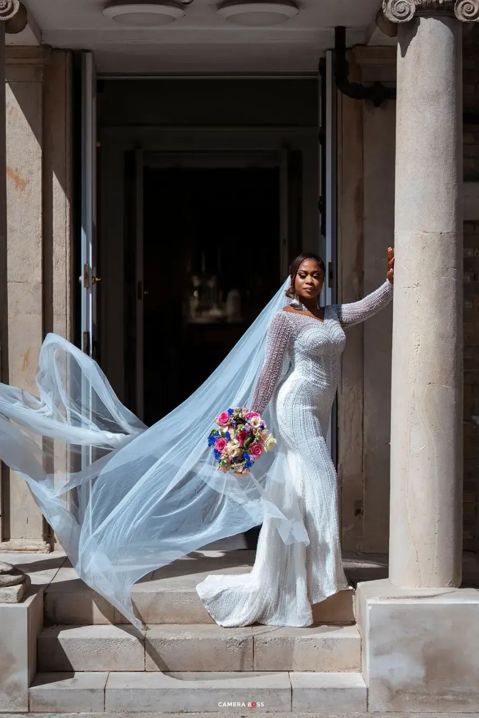 Cynthia in her wedding dress and veil. CameraBoss portfolio: Cynthia and Oswaldo.