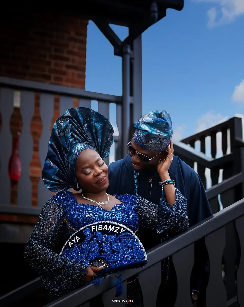 The couple together on the stairs