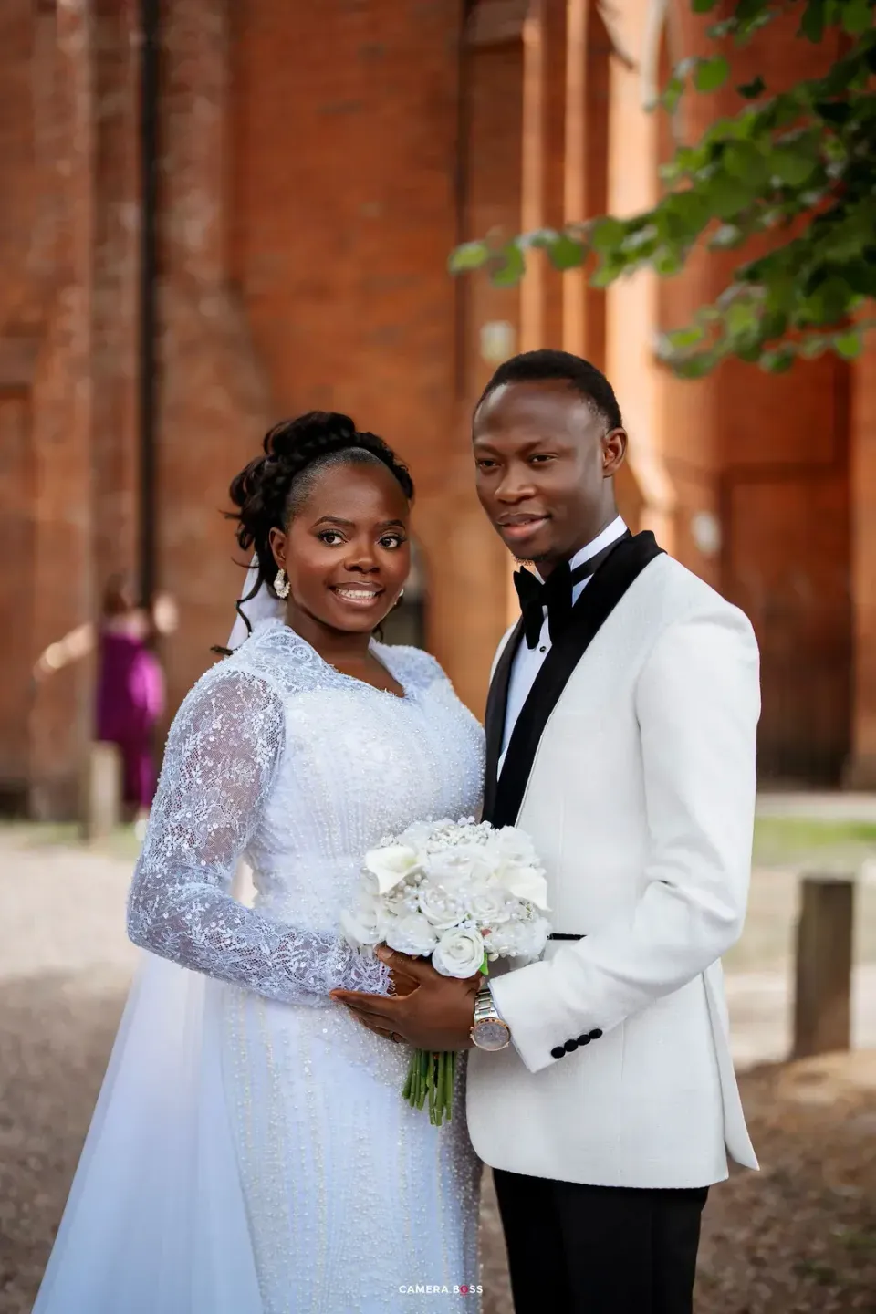 Temi and Fiyin in wedding clothes. CameraBoss portfolio: Temi and Fiyin.