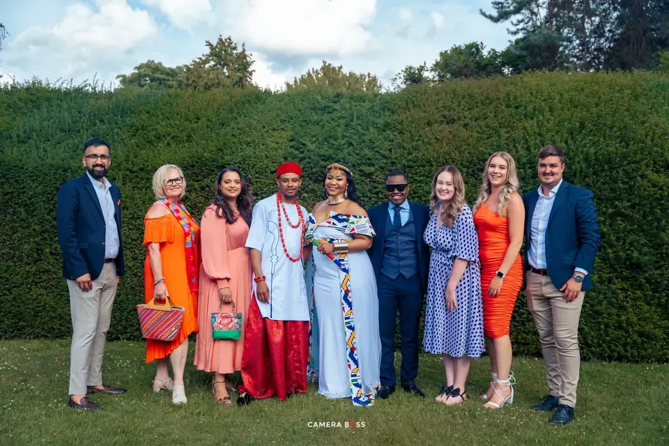 The wedding party gathered for a group portrait