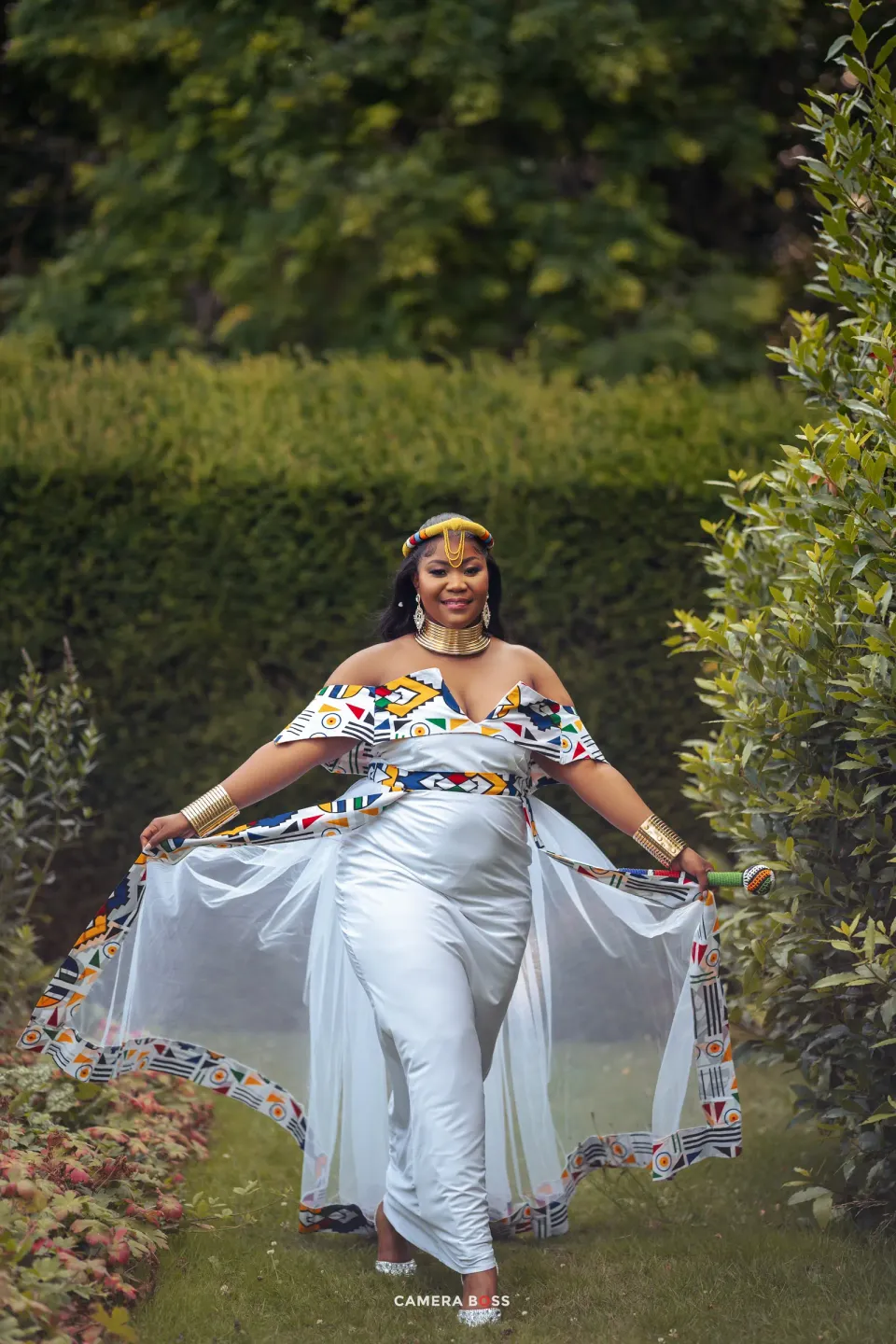 Vanessa standing in the garden. CameraBoss portfolio: Vanessa Wedding.