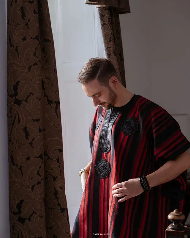 Jonny in a patterned robe beside a window. CameraBoss portfolio: Jo and Jonny.