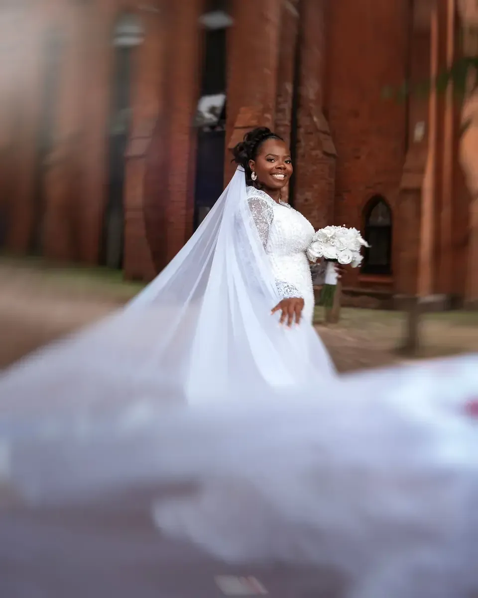 Temi in her white wedding dress