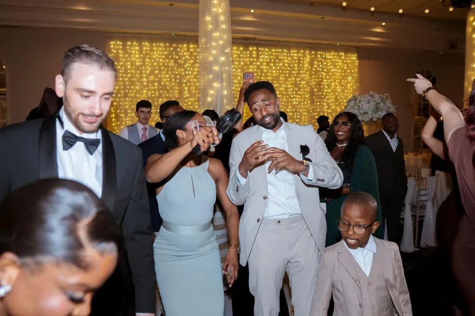 Guests dancing at the wedding reception. CameraBoss portfolio: Jo and Jonny.