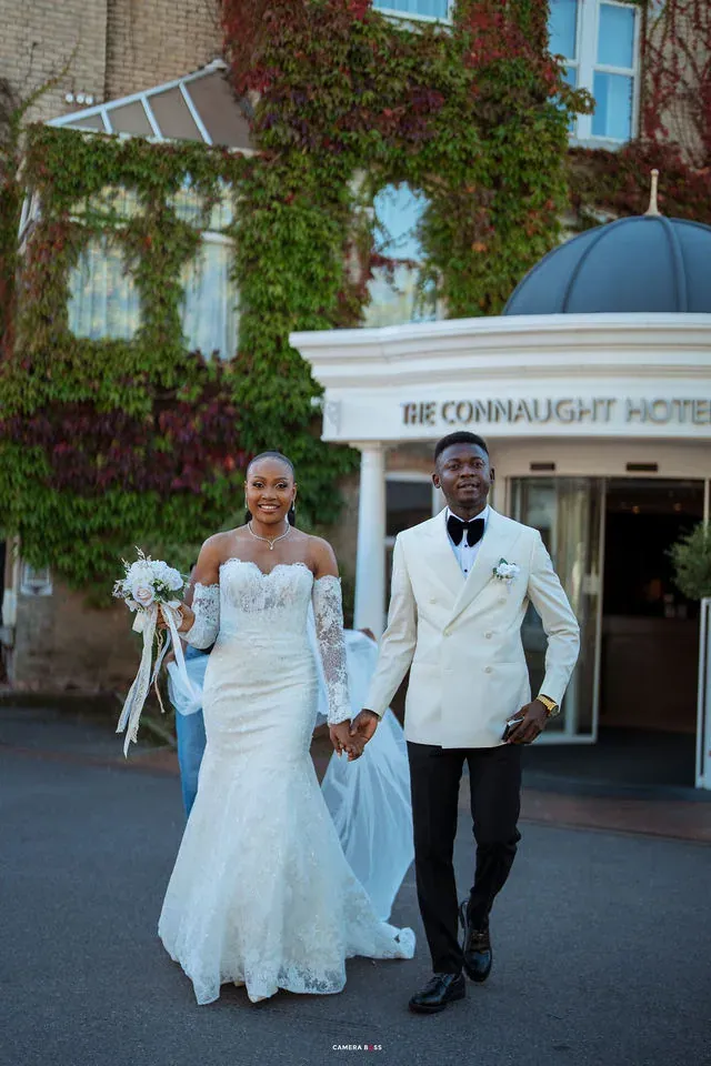 Remi and Daniel walking together outside. CameraBoss portfolio: Remi and Daniel’s Bournemouth civil wedding.