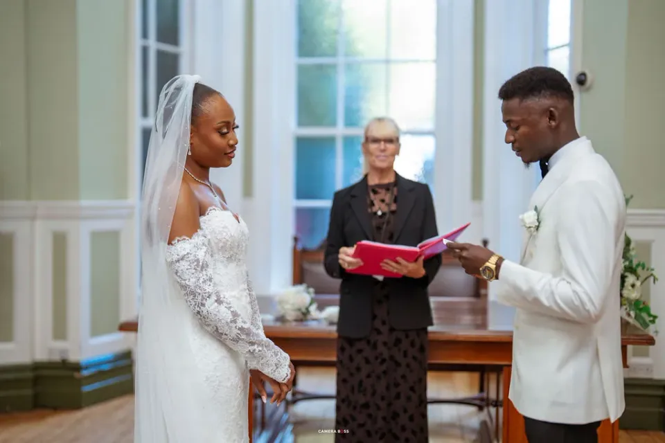 Remi and Daniel reading their vows during the civil ceremony