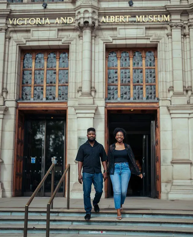 A couple walking down the Victoria and Albert Museum steps. CameraBoss portfolio: Tomilayo Prewedding London.