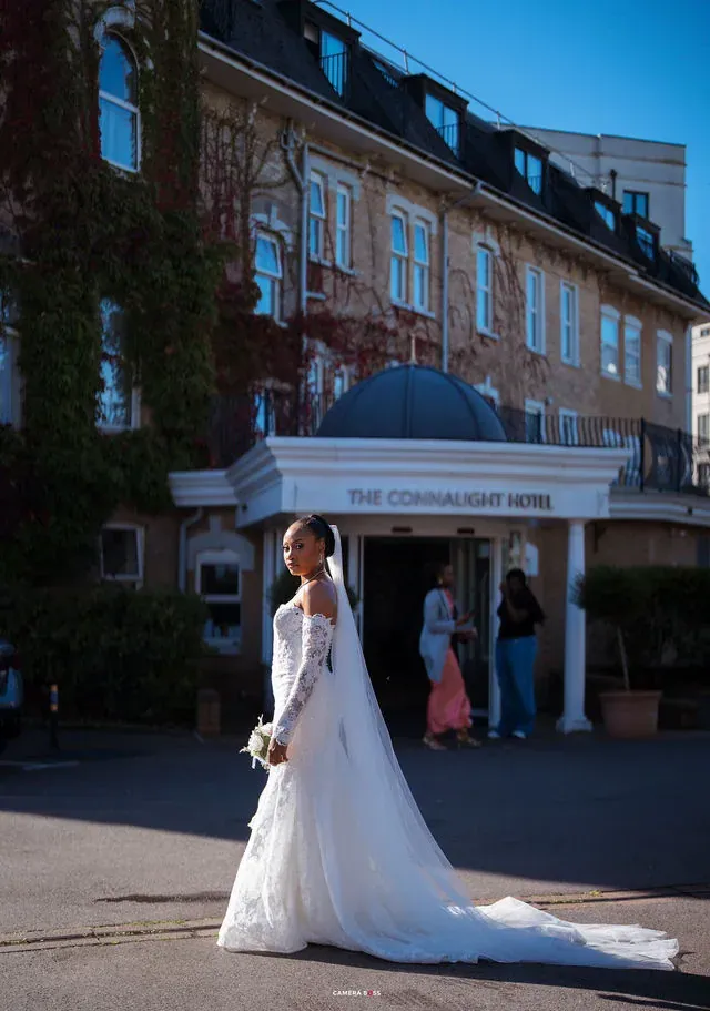 Remi in her wedding dress outside the hotel. CameraBoss portfolio: Remi and Daniel’s Bournemouth civil wedding.
