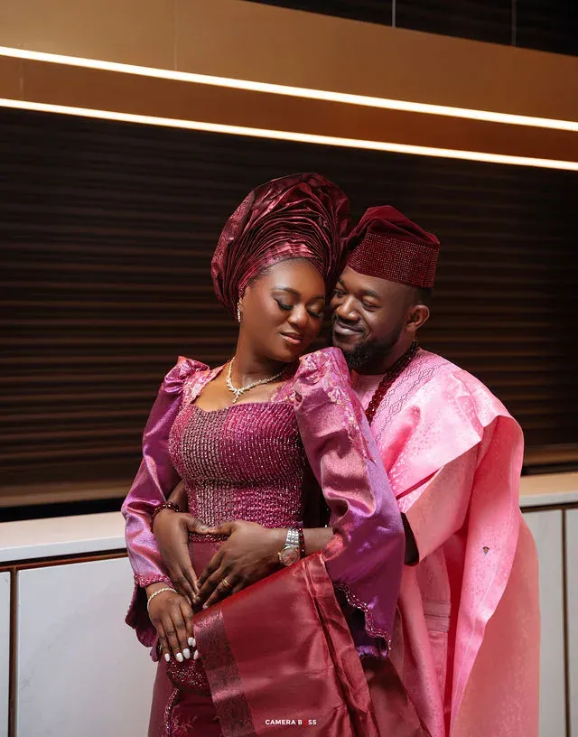 A couple together in pink and purple formal attire. CameraBoss portfolio: Tolu Prewedding Birmingham.