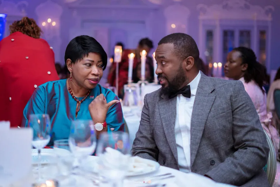 Guests in conversation around a dining table at FLAIR Summit