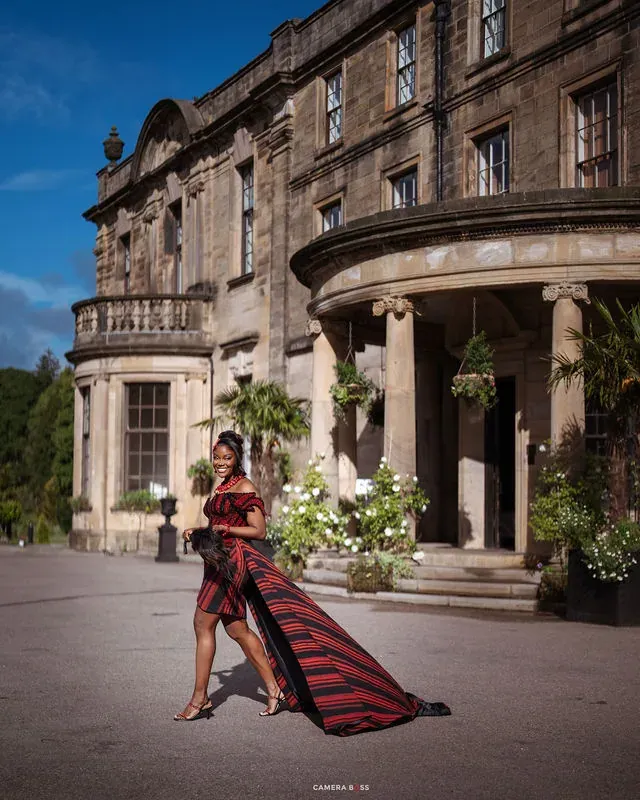 A full-length portrait of Jo in the courtyard. CameraBoss portfolio: Jo and Jonny.