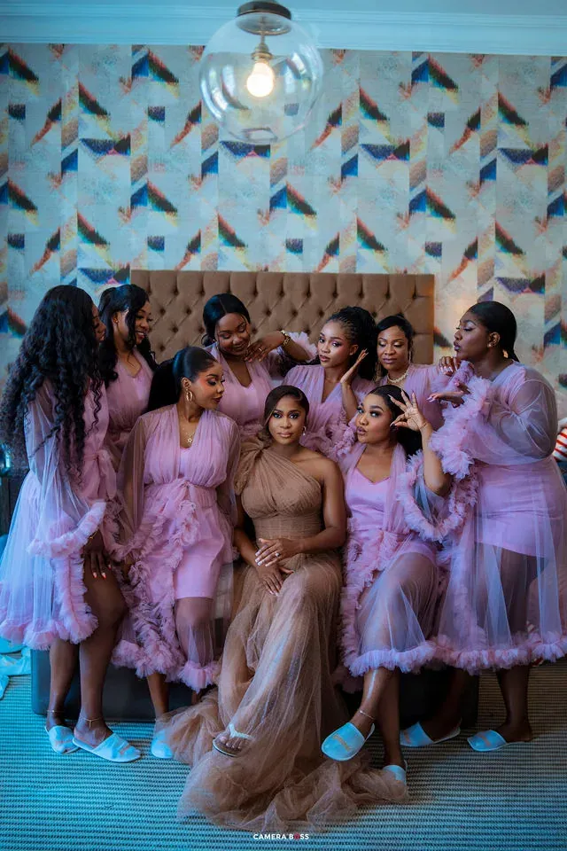 A group portrait of the bride and bridesmaids indoors. CameraBoss portfolio: Cynthia and Oswaldo.