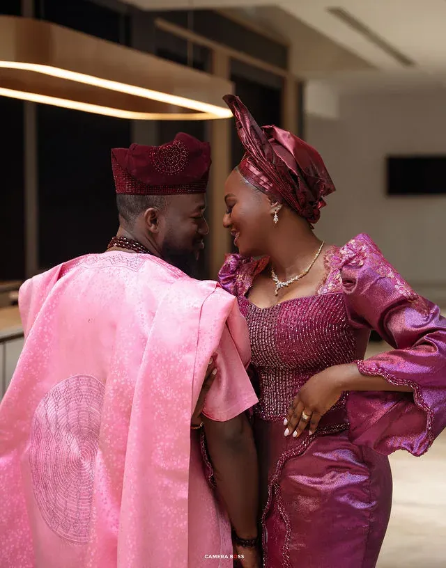 A close portrait of a couple in pink and purple attire. CameraBoss portfolio: Tolu Prewedding Birmingham.