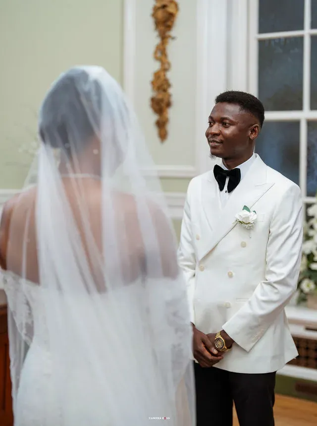 Daniel smiling towards Remi during the ceremony. CameraBoss portfolio: Remi and Daniel’s Bournemouth civil wedding.