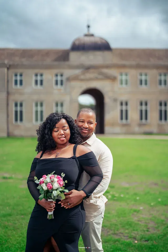 A couple together outside Boughton House. CameraBoss portfolio: Oney Prewedding at Boughton House.