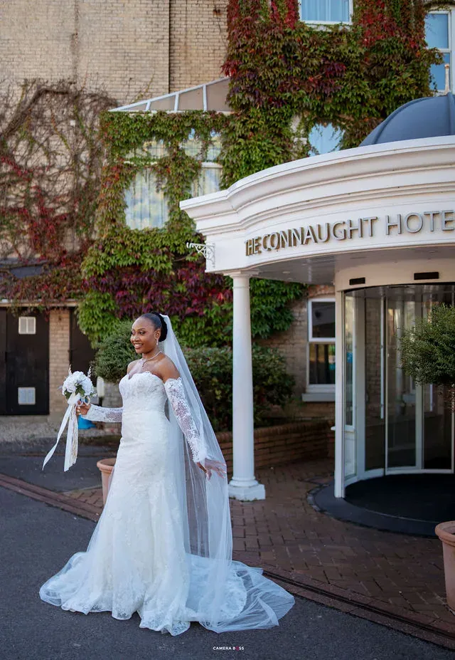 Remi in her wedding dress outside The Connaught Hotel in Bournemouth